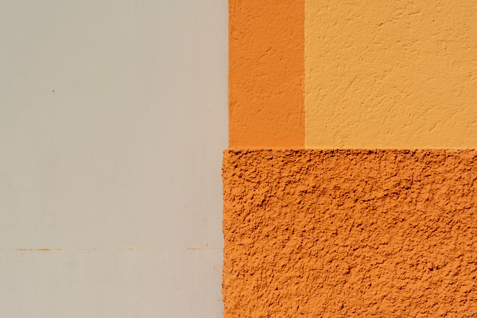 Yellow and orange painted pattern on a wall